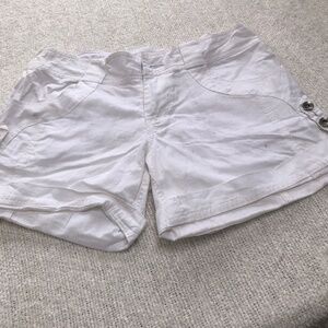 Powder Room size medium white shorts. Lots of buttons and pockets.